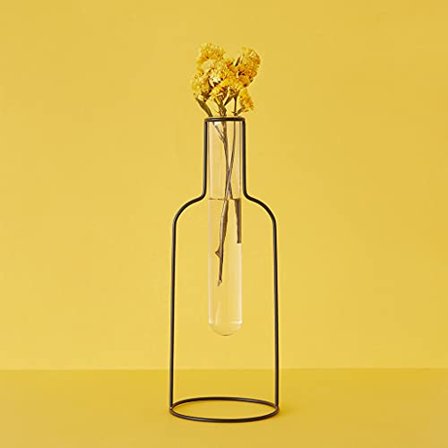Florero Bottle Silhouette – Una silueta de botella que sostiene flores