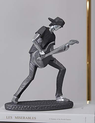 Escultura guitarrista – Solo de rock en resina metálica