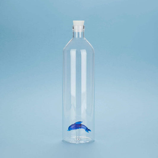 Botella con delfín – Hidratación con figura marina interior