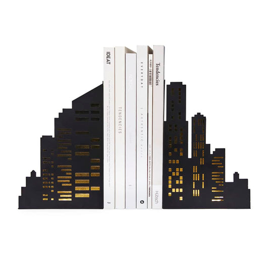 Sujetalibros skyline con luz – La ciudad iluminada entre tus novelas