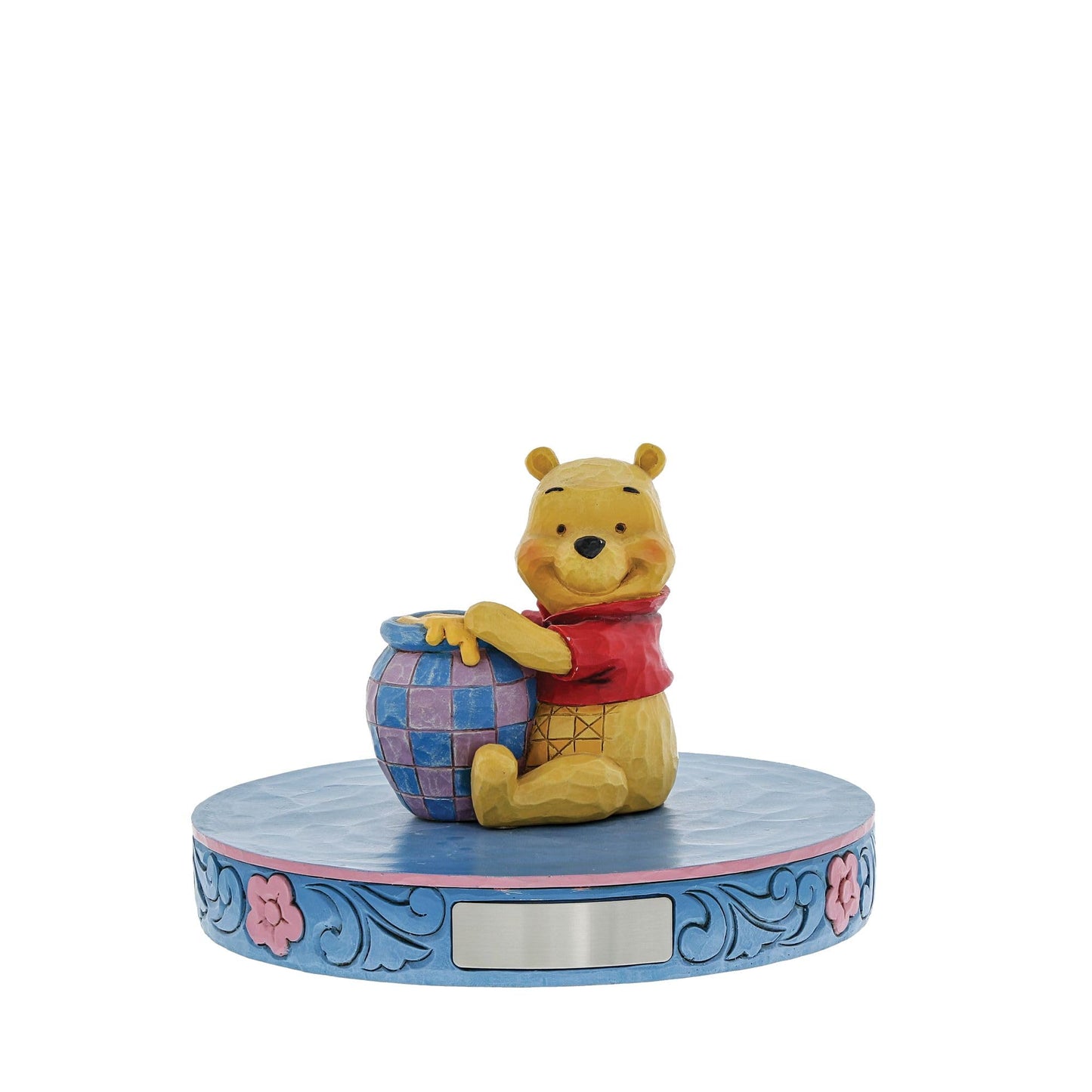 Figura Winnie Pooh – Dulzura esculpida en miel