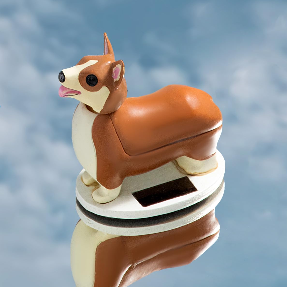 Perro corgi solar – Mueve la cabeza con energía adorable