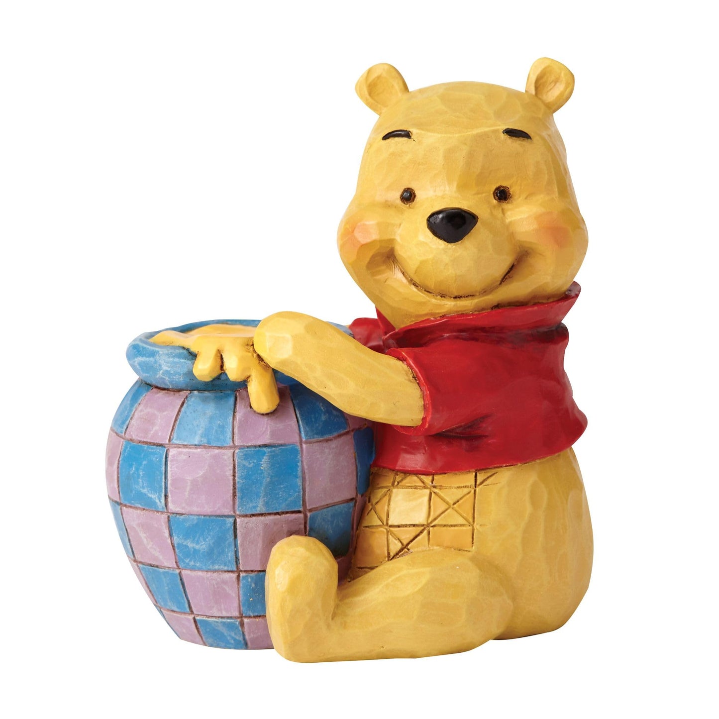 Figura Winnie Pooh – Dulzura esculpida en miel