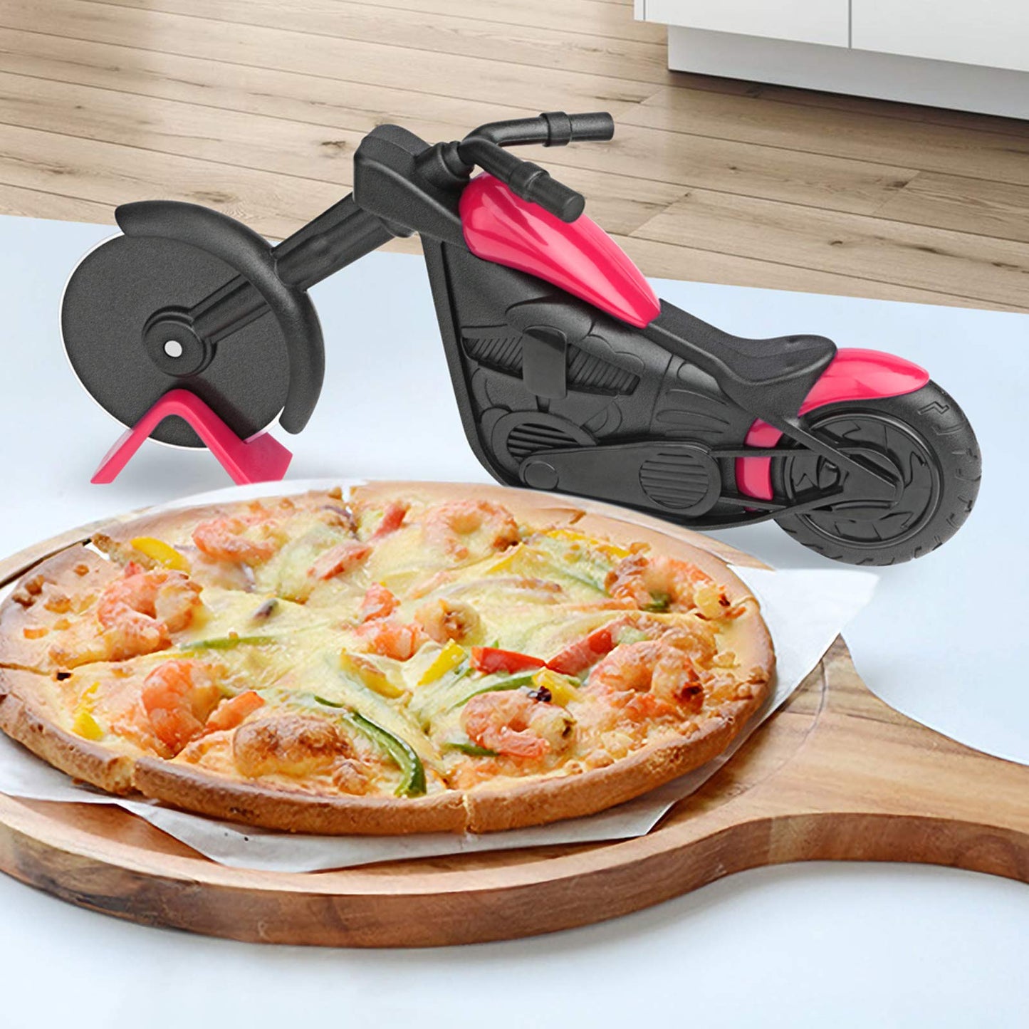 Cortapizza moto – Rueda con queso y velocidad