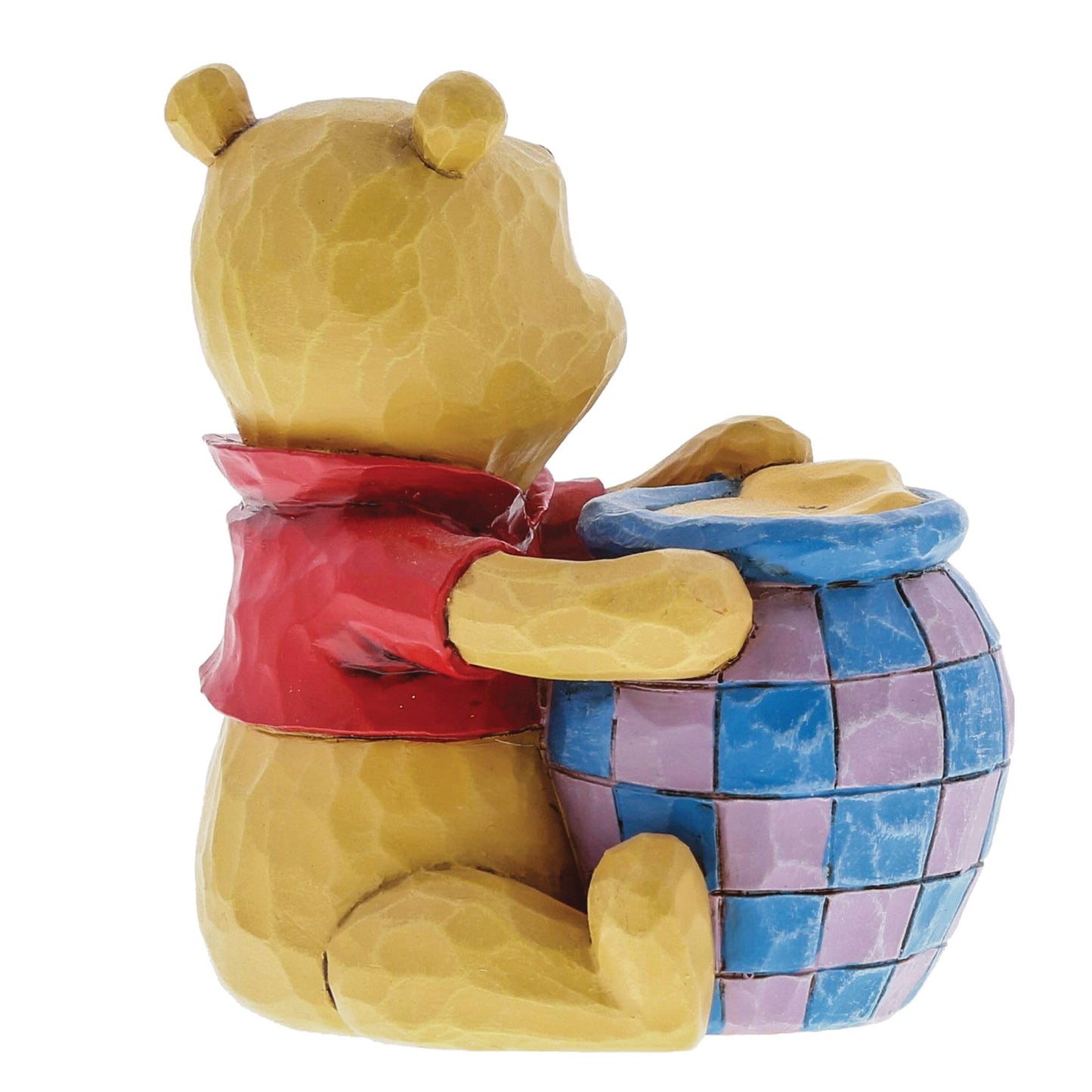 Figura Winnie Pooh – Dulzura esculpida en miel