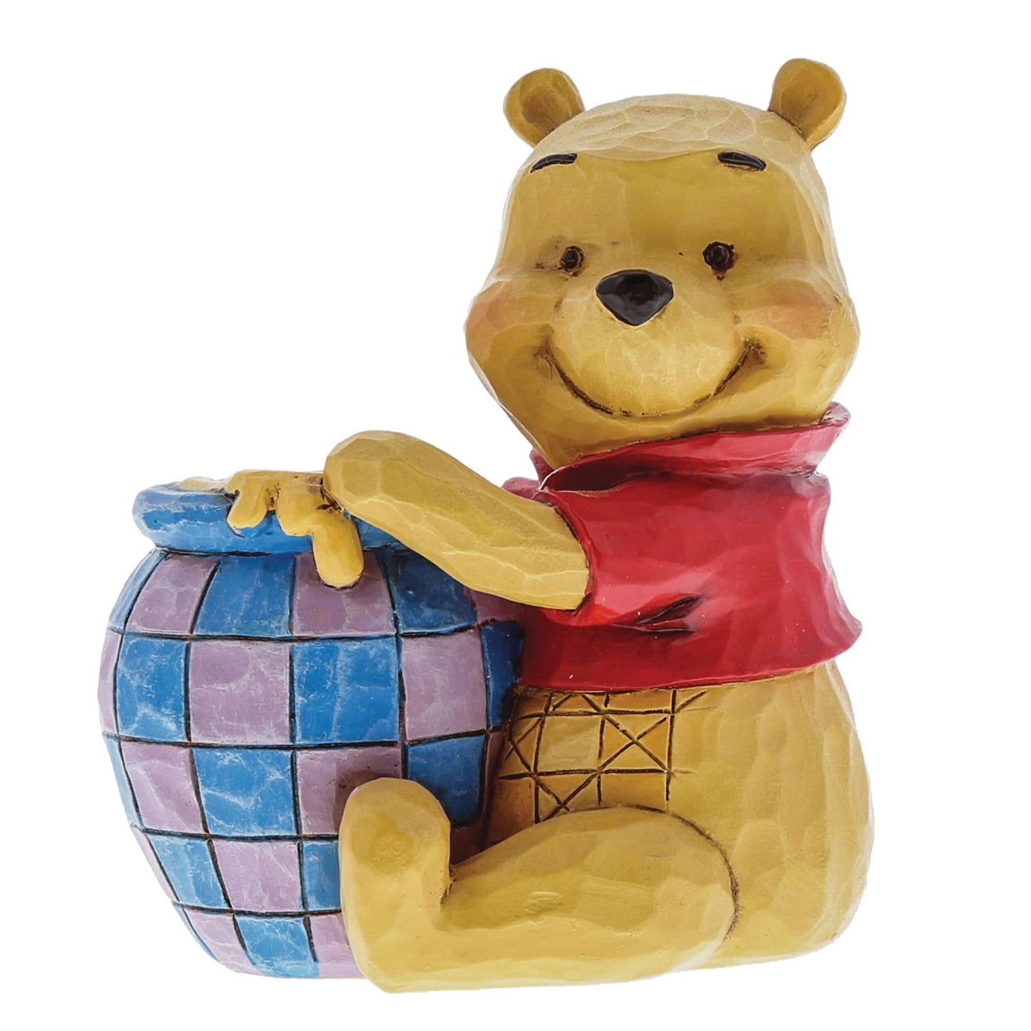 Figura Winnie Pooh – Dulzura esculpida en miel