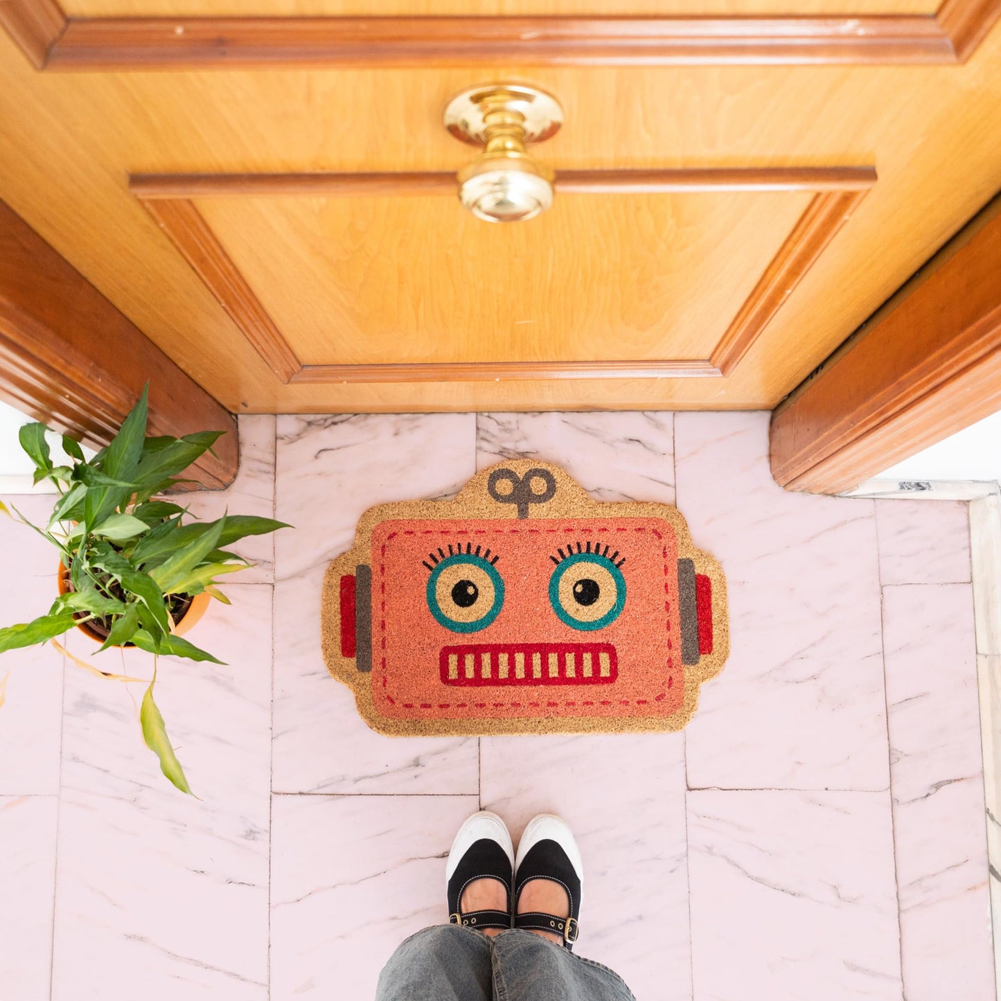 Felpudo robot rosa – Bienvenidas retro en 8 bits