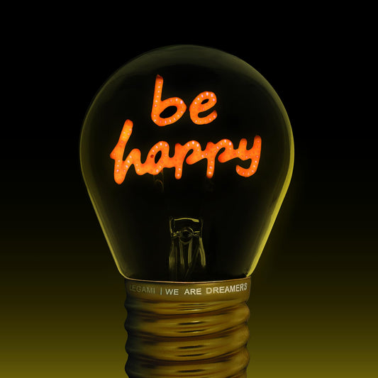 Lámpara bombilla “Be Happy” – Una chispa de alegría en tu rincón favorito